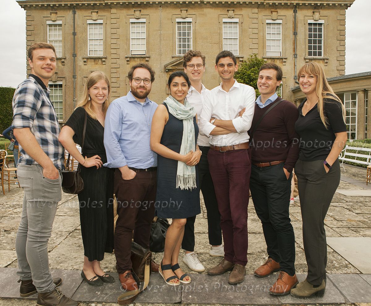 Team photograph of 8 graduate interns